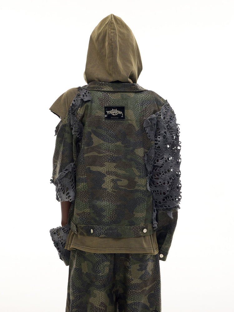 PINKSPINK ELECTRIC MOON distressed camouflage denim jacket — back modeled view showing the camouflage panel and neck label