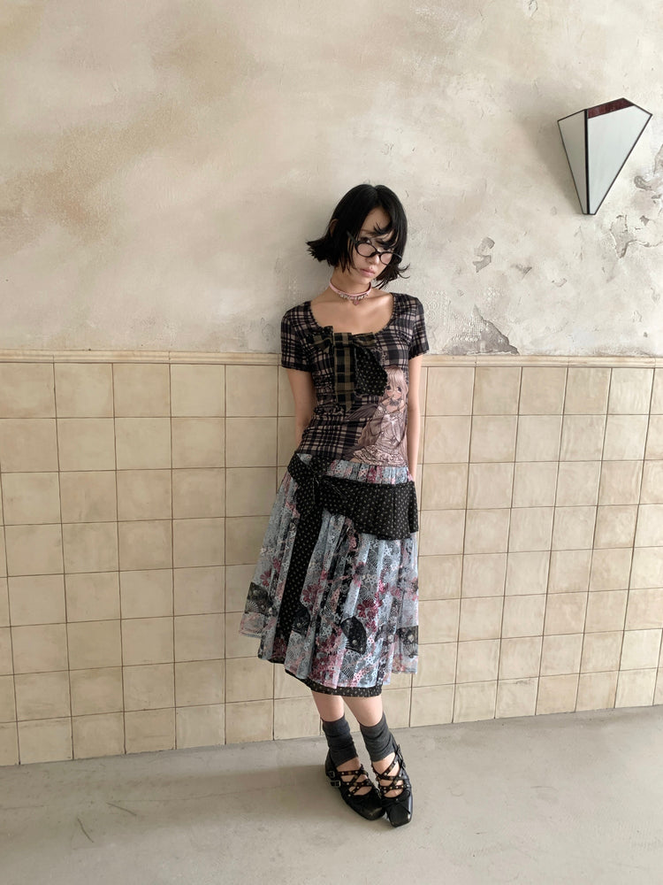 4RE1GN CROSS RIBBON jacquard lace layered skirt in multicolor — front modeled view with arms behind the back