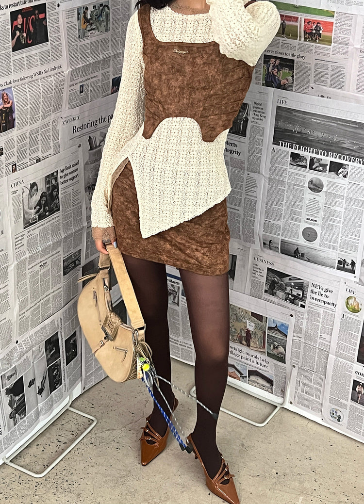 NEXT PASSPORT wasteland-brown shark-pleat vest and mini skirt — vest silhouette detail
