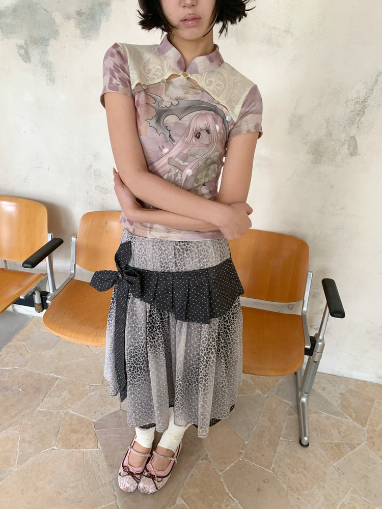 4RE1GN PINK REAPER lace-panel mandarin tee in pink multicolor — close modeled view with arms folded