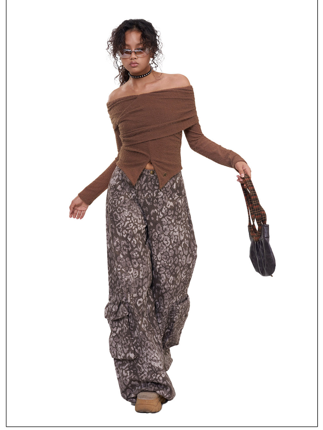NEXT PASSPORT dark-brown twisted off-shoulder long-sleeve tee, white-background walking pose