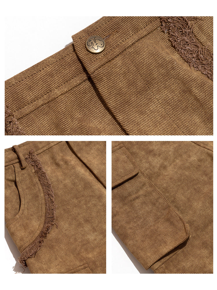 Raw-edge pocket and hardware details of NEXT PASSPORT brown denim maxi skirt