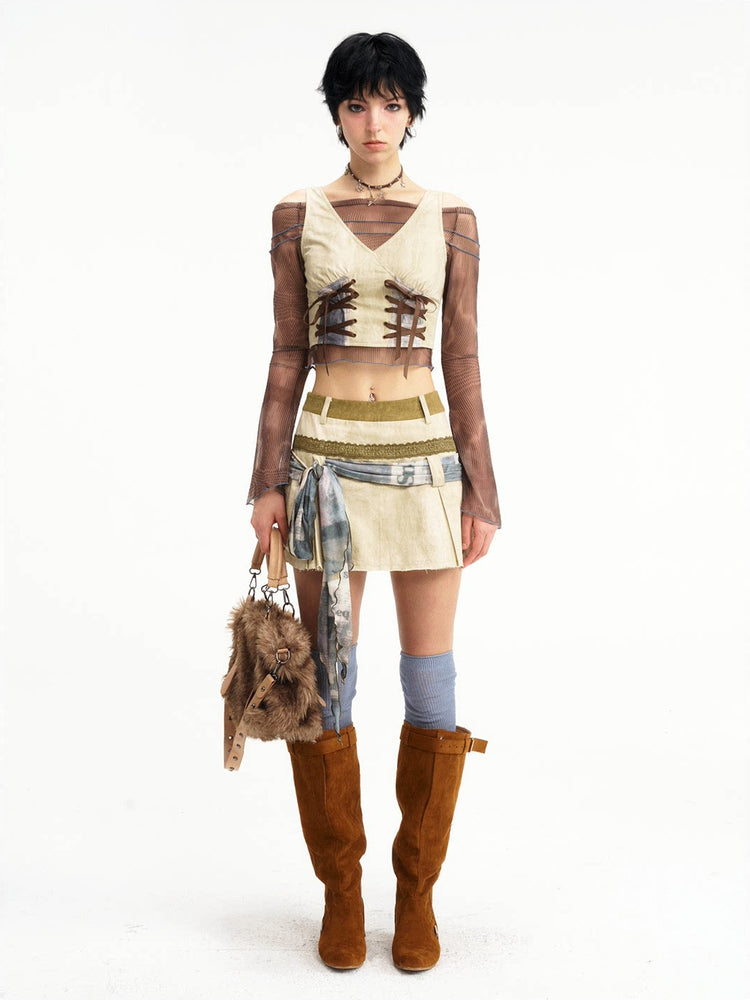 Straight front view of the vest and skirt set