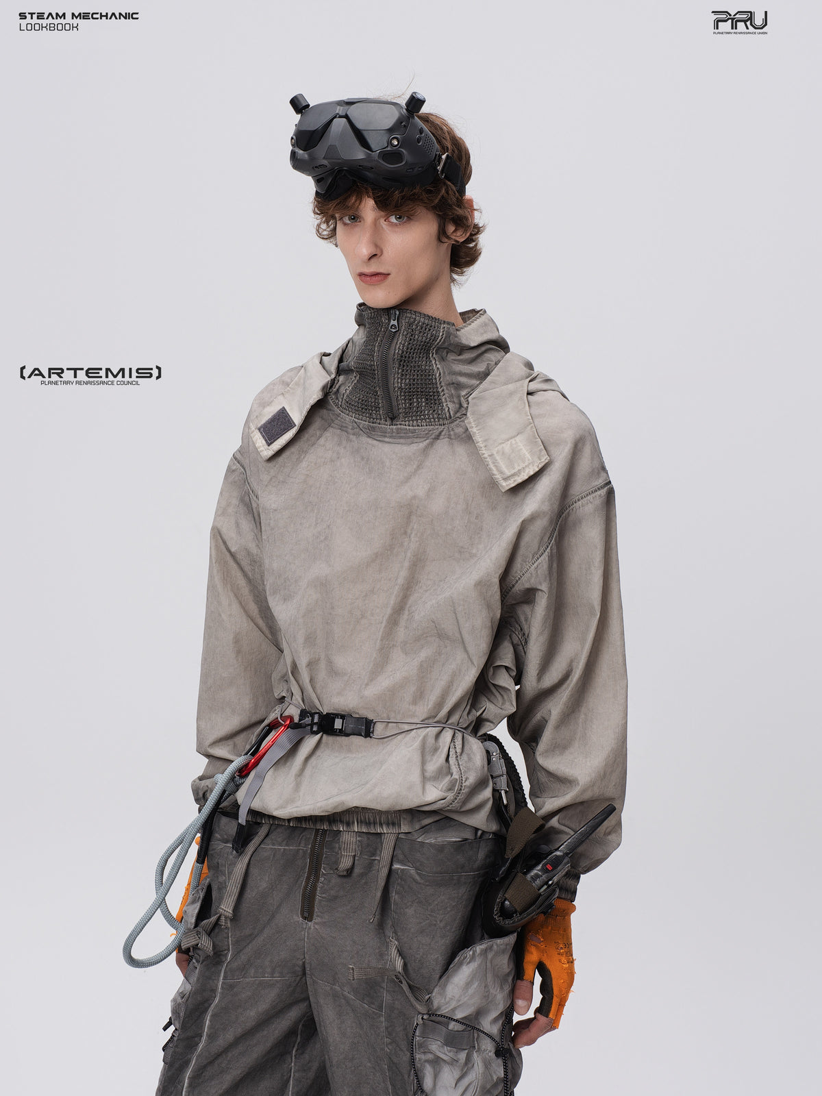 PIONEER meteorite-gray mesh hoodie, three-quarter front pose showing the weathered finish