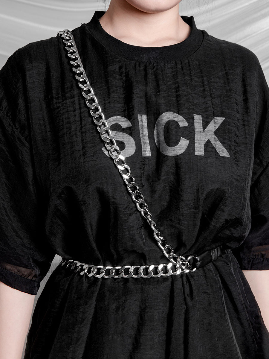 WRAVEN gathered faux-leather curb-chain belt — front close-up of waist and crossbody styling; clothing not included.