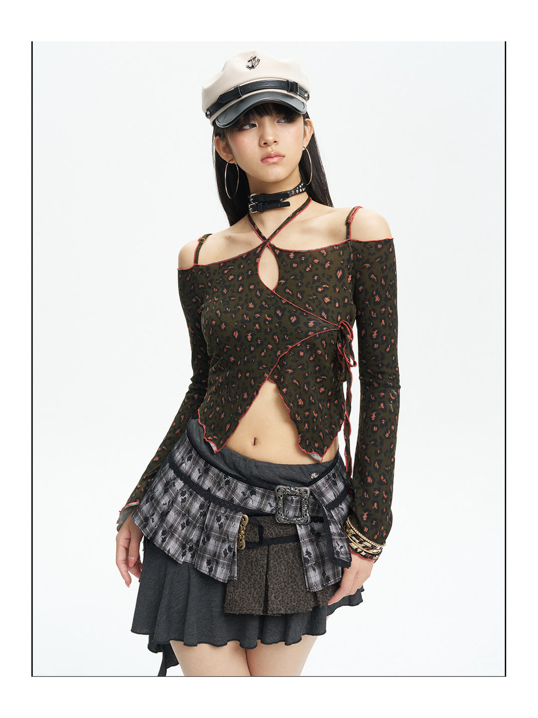 Close front view of the leopard top and adjustable lace-up ties