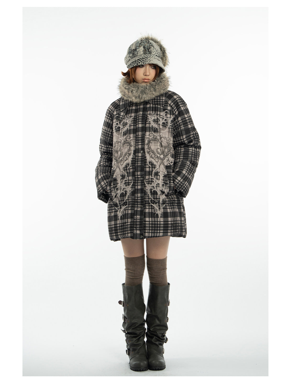 4RE1GN BEARHEART plaid long down coat in brown multicolor — three-quarter modeled view with the furry collar and tall boots
