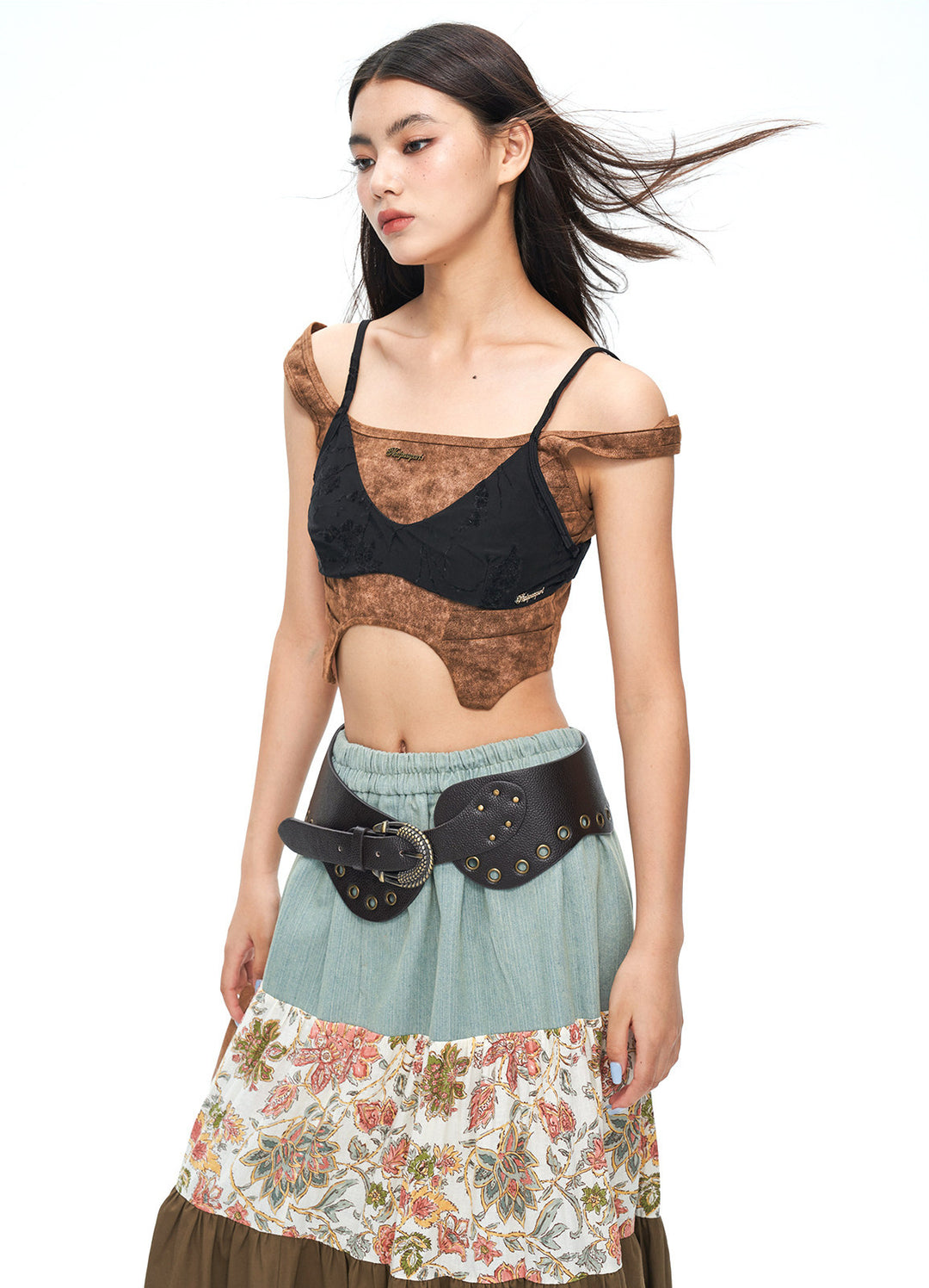 NEXT PASSPORT wasteland-brown shark-pleat vest and mini skirt — skirt silhouette detail