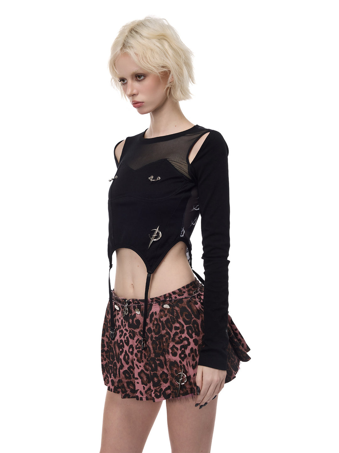 PINKSPINK ELECTRIC MOON reconstructed mesh tee — three-quarter modeled view styled with a pink leopard mini skirt