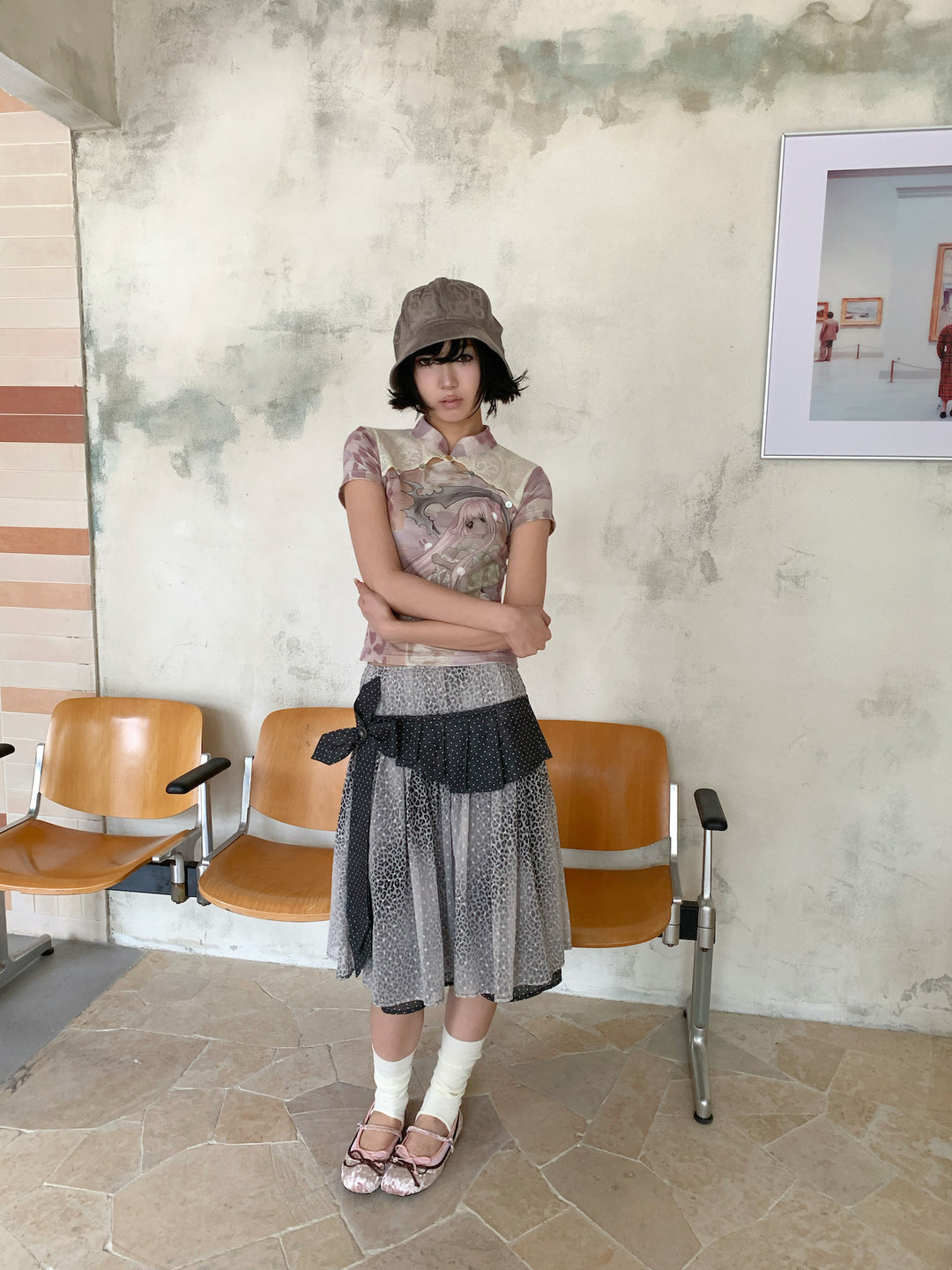 4RE1GN PINK REAPER lace-panel mandarin tee in pink multicolor — full-length modeled view with arms folded