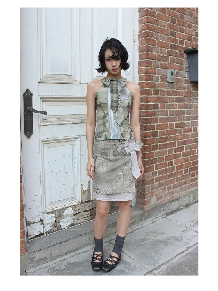 4RE1GN CROSS LEOPARD bow-detail layered skirt in beige multicolor — full-length modeled view from the side of a doorway
