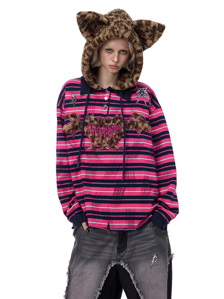 PINKSPINK CAT ALIEN leopard-ear striped hoodie — front modeled view with the hood up and hands in pockets