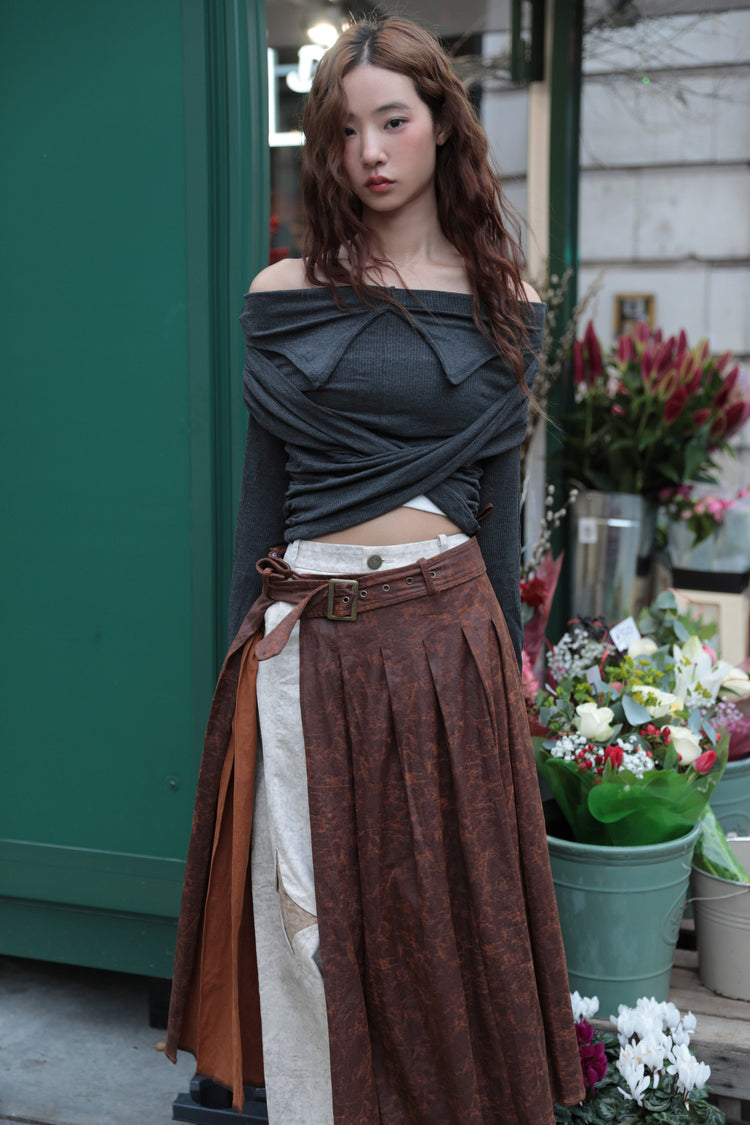 Brown faux-suede pleated wrap maxi skirt modeled at a flower market