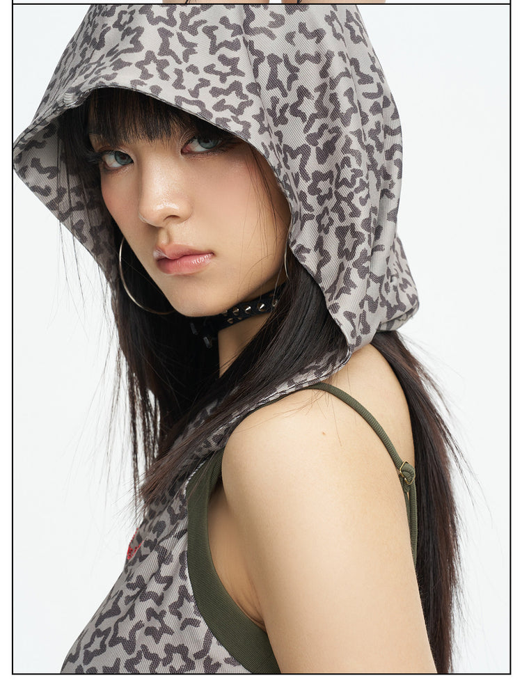 Close hood and shoulder detail of the leopard-print vest