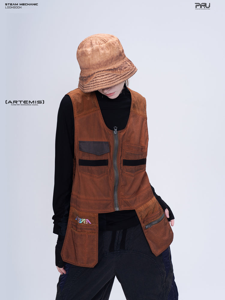 PIONEER sedna-red multi-pocket vest, front modeled pose with head lowered and hand at pocket
