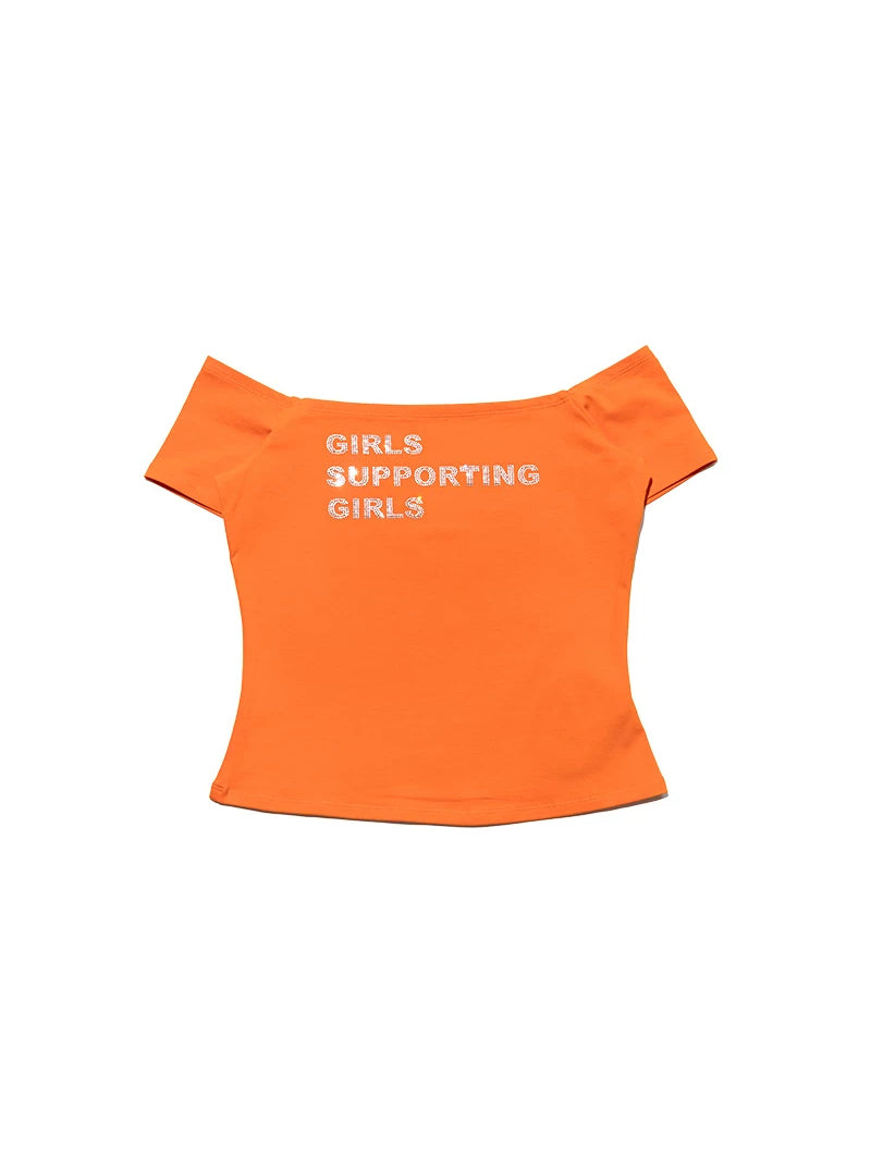 NEXT PASSPORT GIRLS SUPPORTING GIRLS rhinestone off-shoulder crop tee — orange garment-only front view.