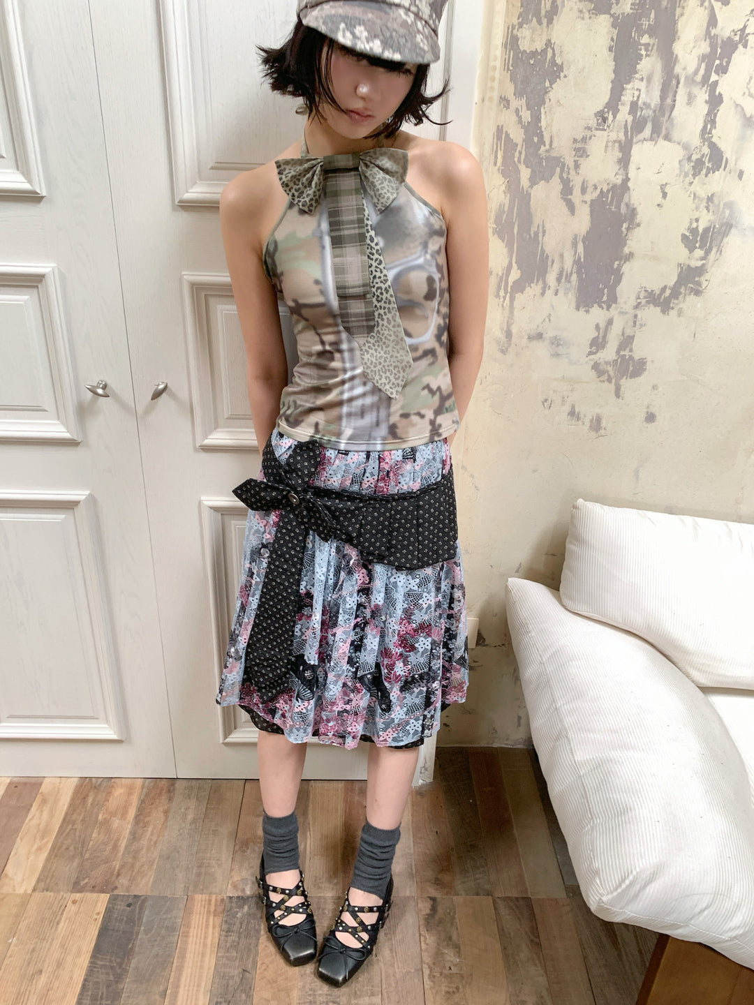 4RE1GN DEAR NINA camouflage tie-neck halter top in camo green — close outfit view showing the top and layered skirt