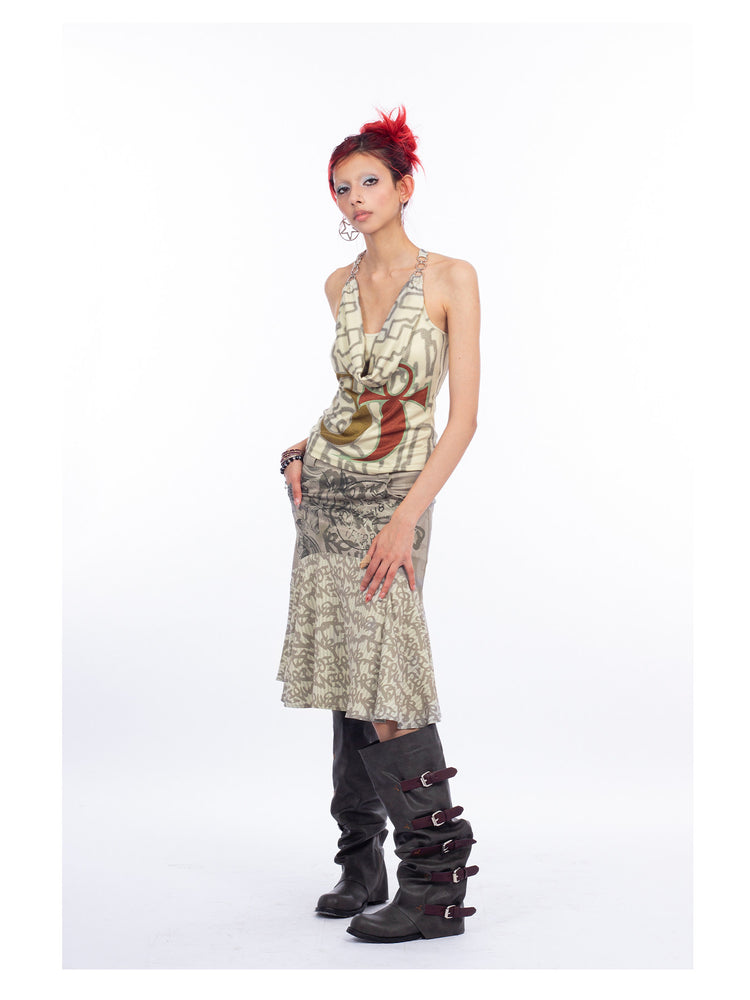 4RE1GN SIGIL cowl-neck halter top in ivory multicolor — full-length three-quarter modeled view with a printed midi skirt
