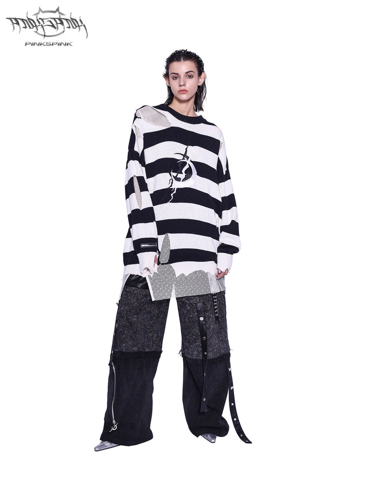 PINKSPINK ELECTRIC MOON distressed striped sweater in BLACK WHITE STRIPE — straight-on full-body view styled with dark cargo trousers.