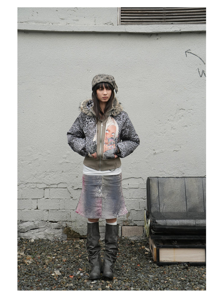 4RE1GN NAILS DONE leopard graphic down jacket in gray multicolor — full-length front modeled view beside a studio bench