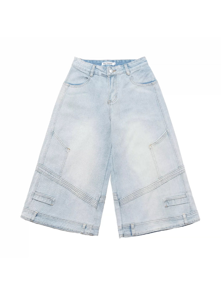 Flat-lay front view of the light-blue cropped wide-leg jeans