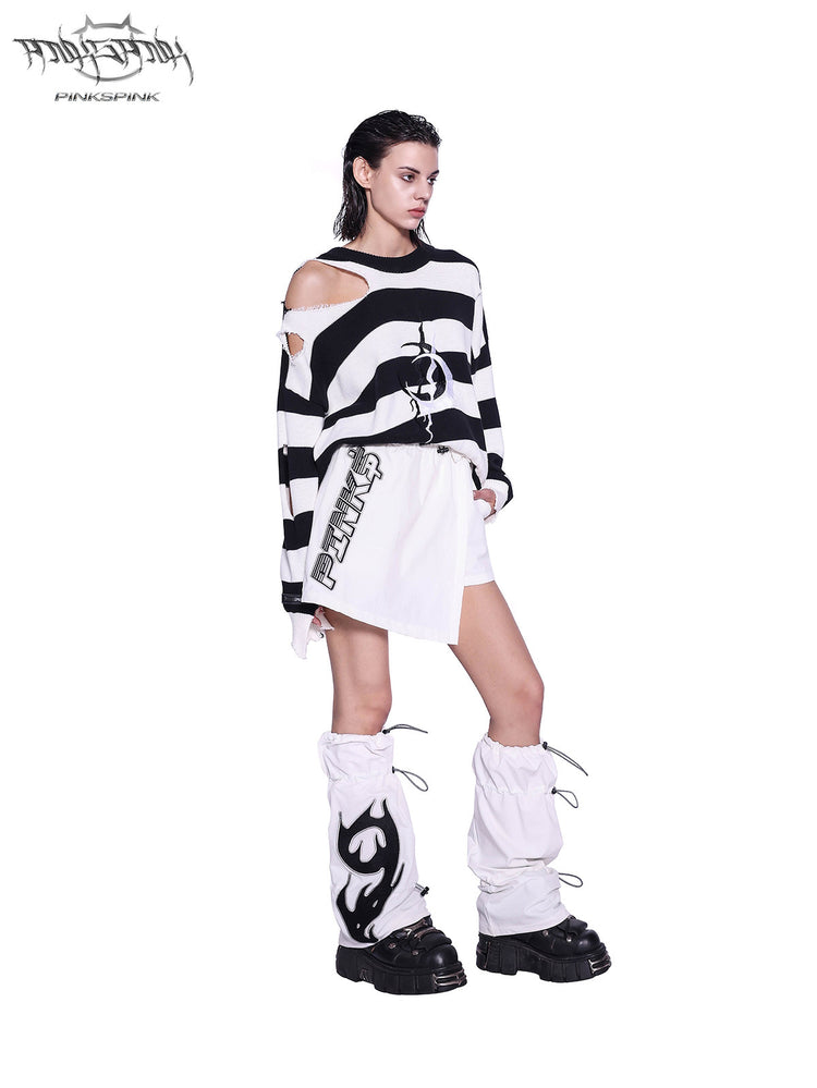 PINKSPINK ELECTRIC MOON distressed striped sweater in BLACK WHITE STRIPE — full-body profile styled with a white skirt and leg warmers.