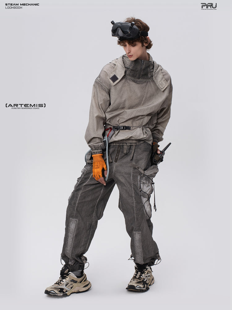 PIONEER meteorite-gray mesh hoodie, full-body angled pose with the model looking down