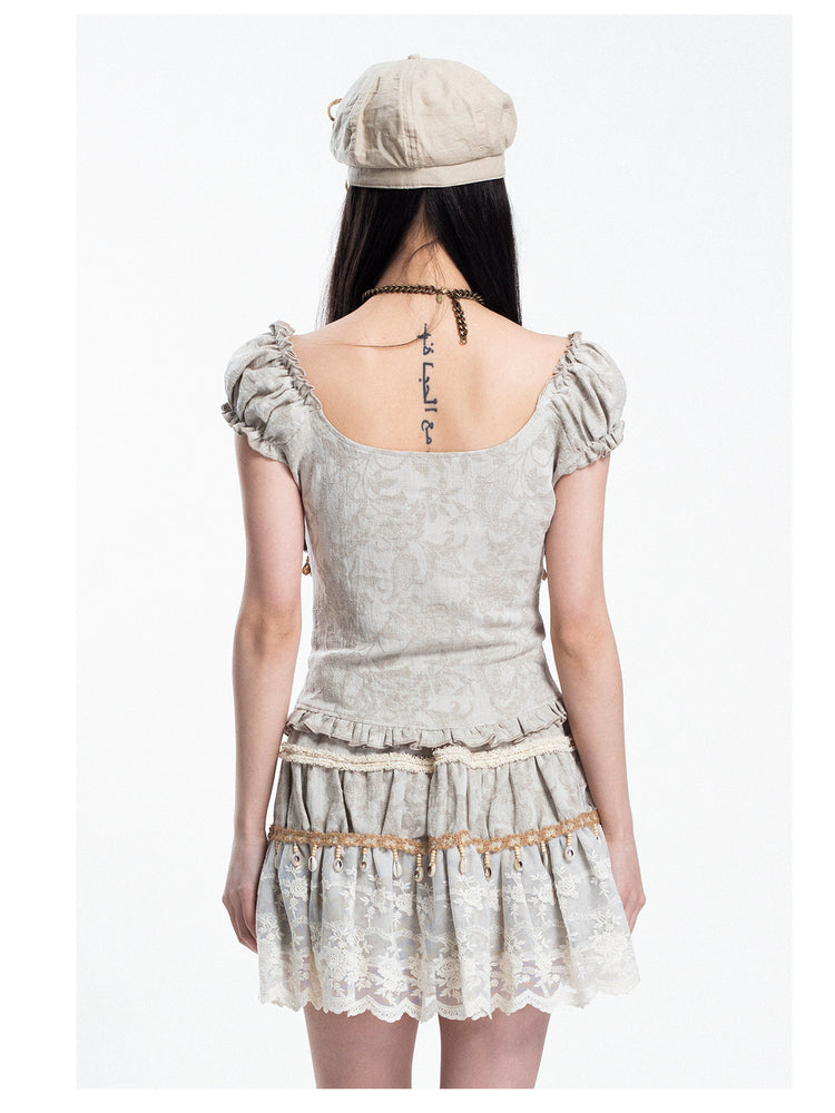 4RE1GN SHELL jacquard blouse and lace skirt separates in ivory — rear modeled view with hair lifted to show the blouse back