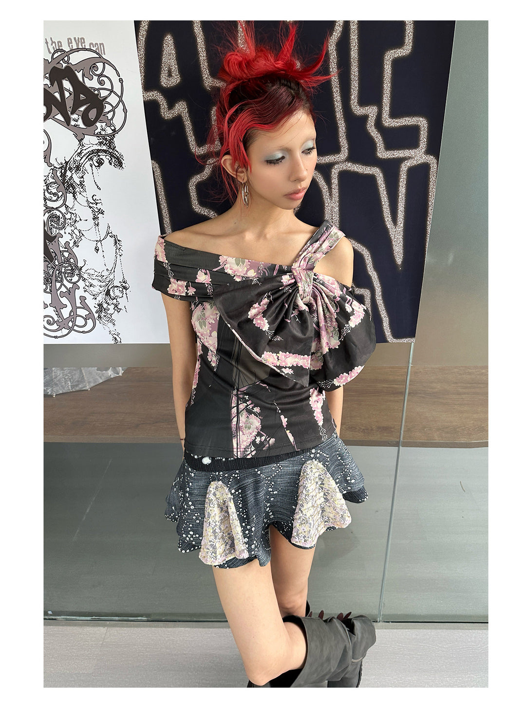 4RE1GN JEWEL denim-print lace mini skirt in black multicolor — front three-quarter modeled view with one knee bent