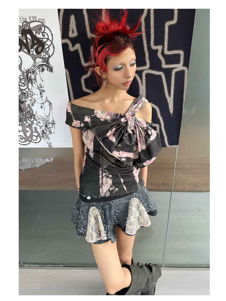4RE1GN JEWEL denim-print lace mini skirt in black multicolor — front three-quarter modeled view with one knee bent
