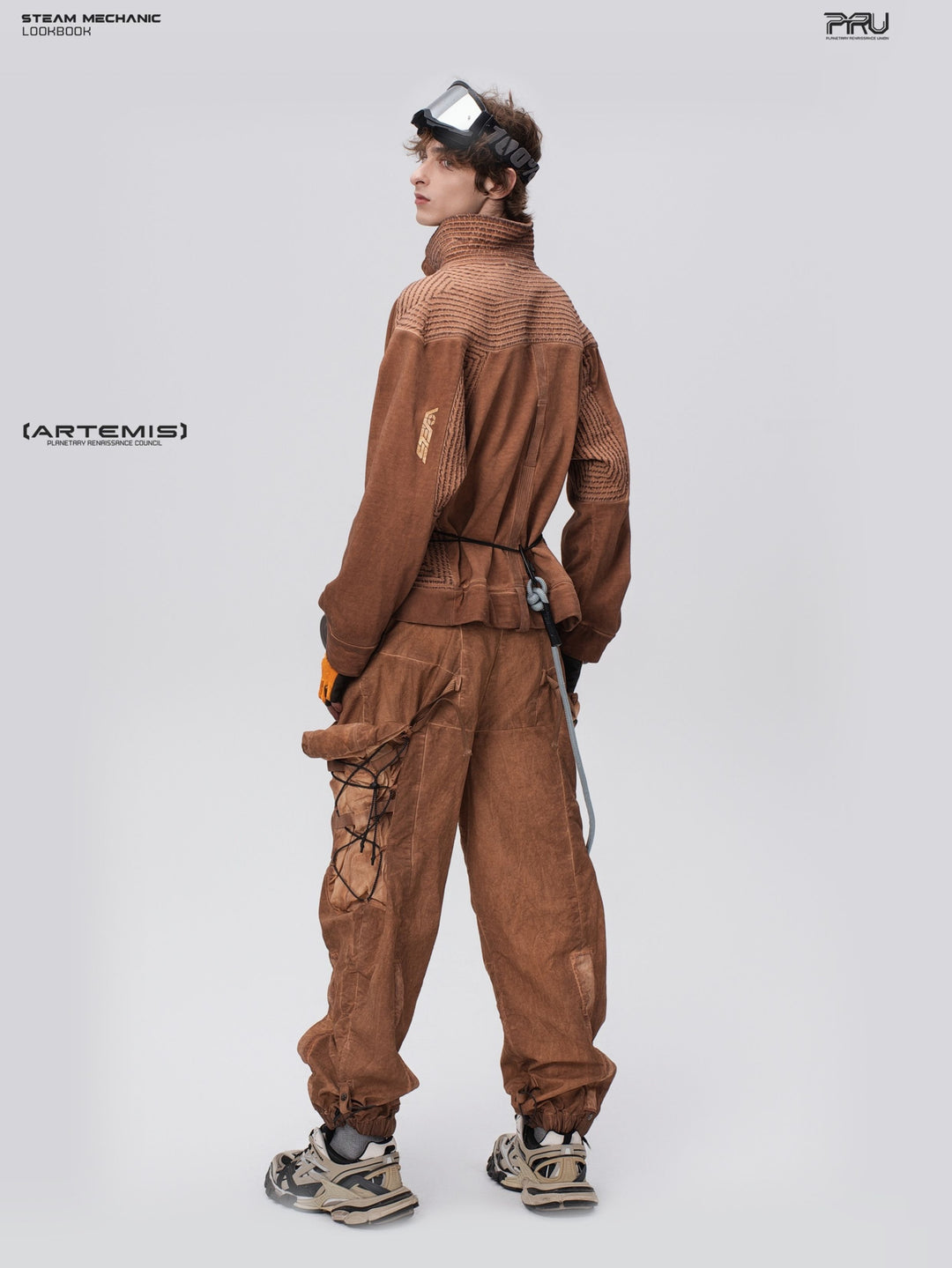 PIONEER cargo pants in Corona Orange, full-length rear three-quarter view