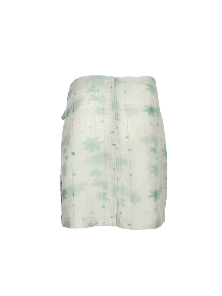 4RE1GN BLUE BLOOM tie-front layered skirt in blue multicolor — back garment-only view showing the pale floral print