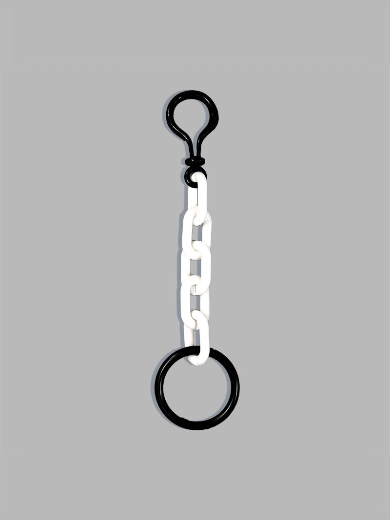 COLLATERAL — keyring white with black metal hardware