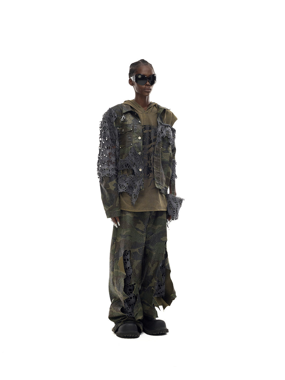 PINKSPINK DOUBLE STACK distressed camouflage wide-leg jeans — angled full-length modeled view showing the stacked legs