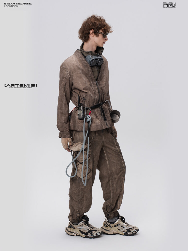 PIONEER cargo pants in Gravel Brown, angled full-length modeled view