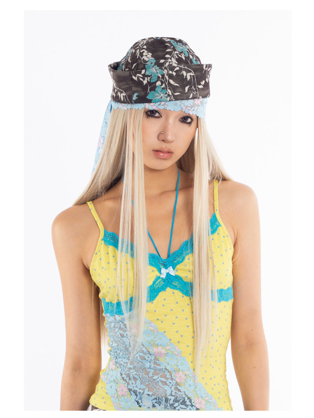 4RE1GN MYSTIC printed brimless hat — blue floral print — front close-up showing the folded shape