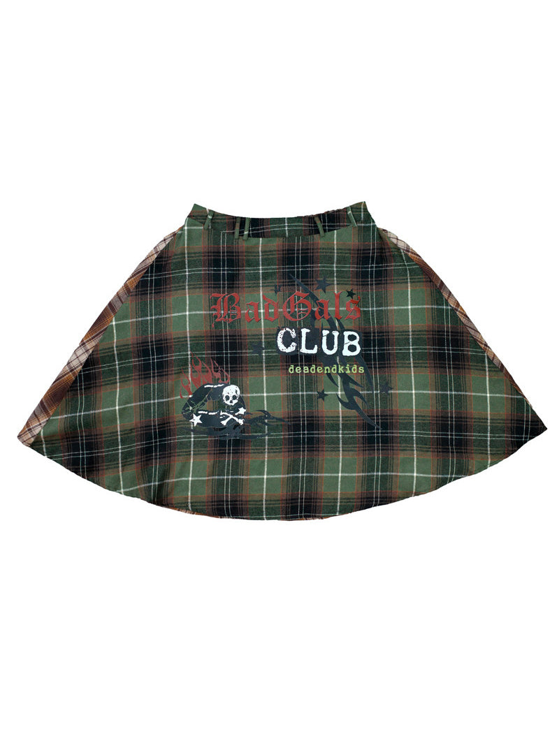 DEADENDKIDS BADGALS CLUB plaid A-line skirt in green brown plaid — isolated front view showing the contrast plaid and printed graphics