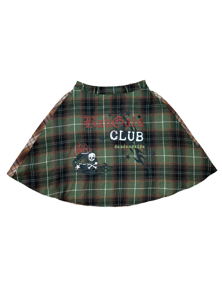 DEADENDKIDS BADGALS CLUB plaid A-line skirt in green brown plaid — isolated front view showing the contrast plaid and printed graphics