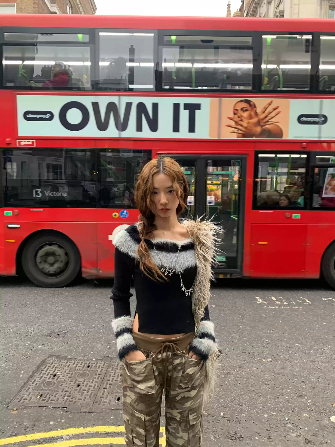 Next Passport black faux-fur collar knit pullover full street view