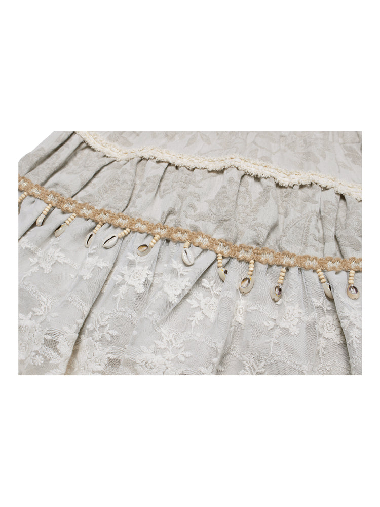 4RE1GN SHELL jacquard blouse and lace skirt separates in ivory — close-up of the skirt jacquard, shells and lace layers