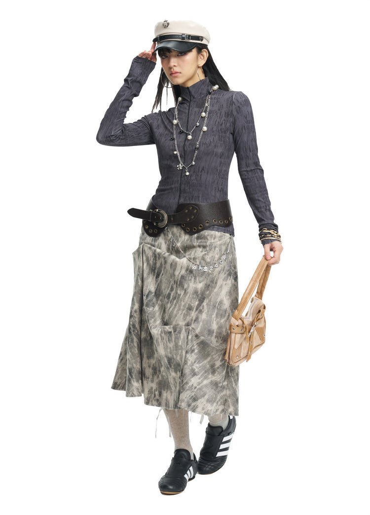 NEXT PASSPORT dark gray fitted mock-neck long-sleeve tee styled with a midi skirt.