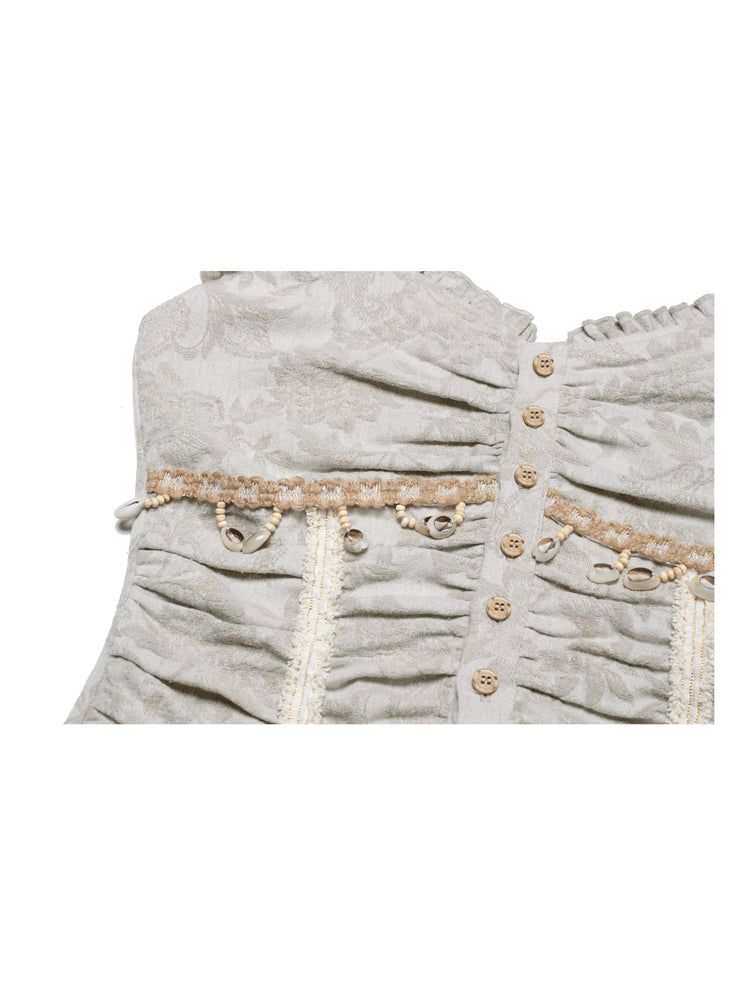 4RE1GN SHELL jacquard blouse and lace skirt separates in ivory — close-up of the blouse buttons, gathering and shell trim