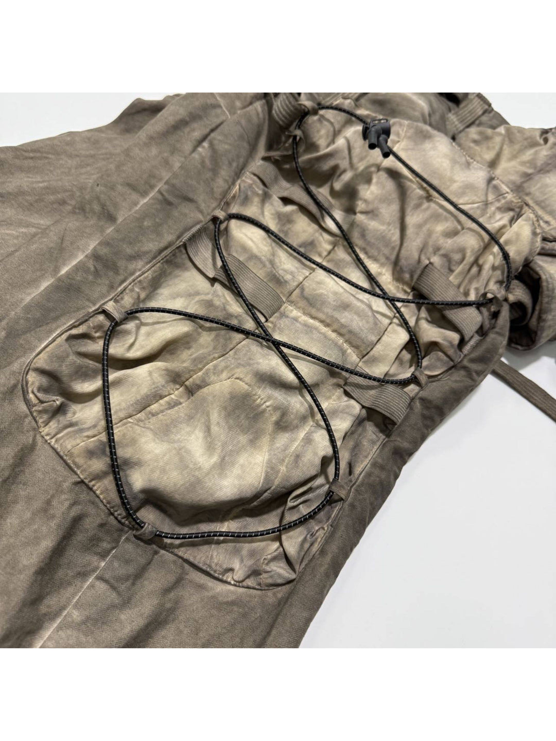 PIONEER cargo pants side utility pocket and drawcord detail