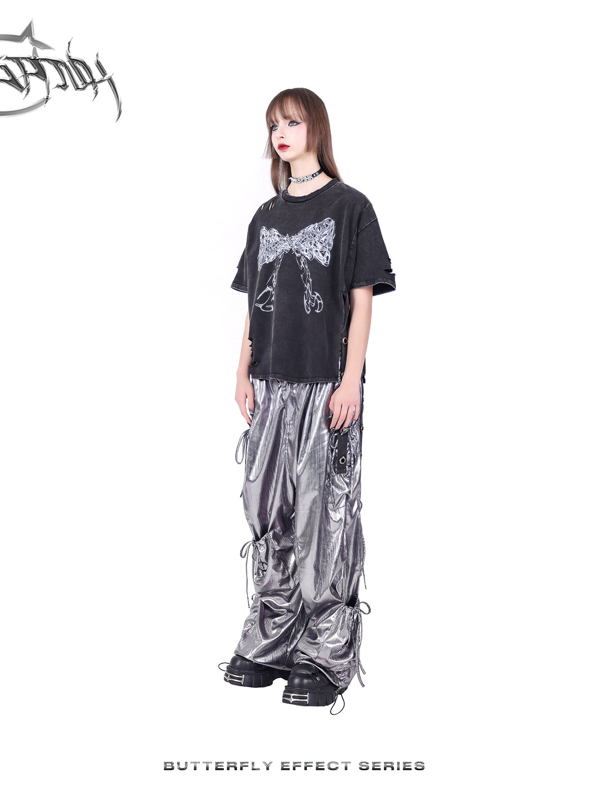 PINKSPINK BUTTERFLY EFFECT distressed tie-side tee — washed black three-quarter full-body view showing the relaxed silhouette.