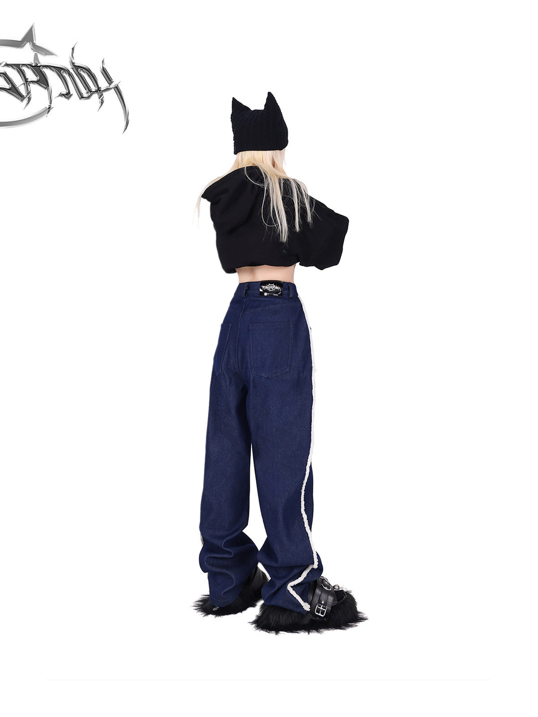 PINKSPINK fleece-striped wide-leg jeans — back modeled view with the hoodie lifted to show the waist and patch pockets