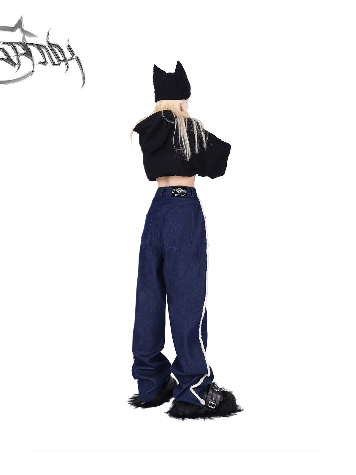 PINKSPINK fleece-striped wide-leg jeans — back modeled view with the hoodie lifted to show the waist and patch pockets