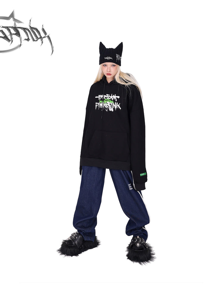 PINKSPINK fleece-striped wide-leg jeans — front full-length modeled view styled with a graphic hoodie