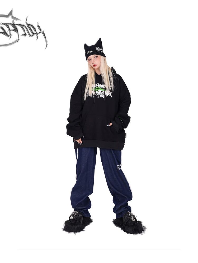 PINKSPINK fleece-striped wide-leg jeans — front full-length modeled view with hands in a hoodie pocket