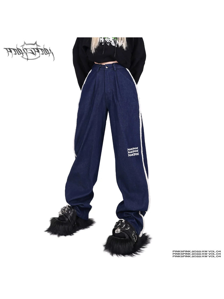 PINKSPINK fleece-striped wide-leg jeans — front waist-to-hem modeled close-up showing white fleece stripes on navy denim