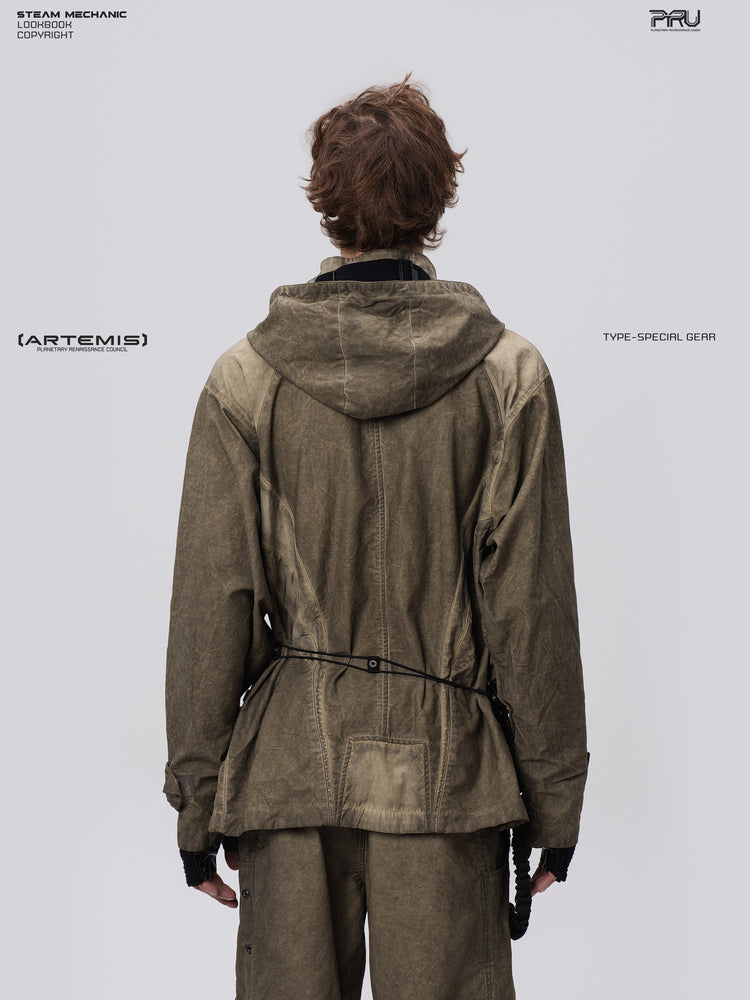 STARCORE distressed work jacket in lunar soil green — back modeled close-up showing hood and geometric rear panels